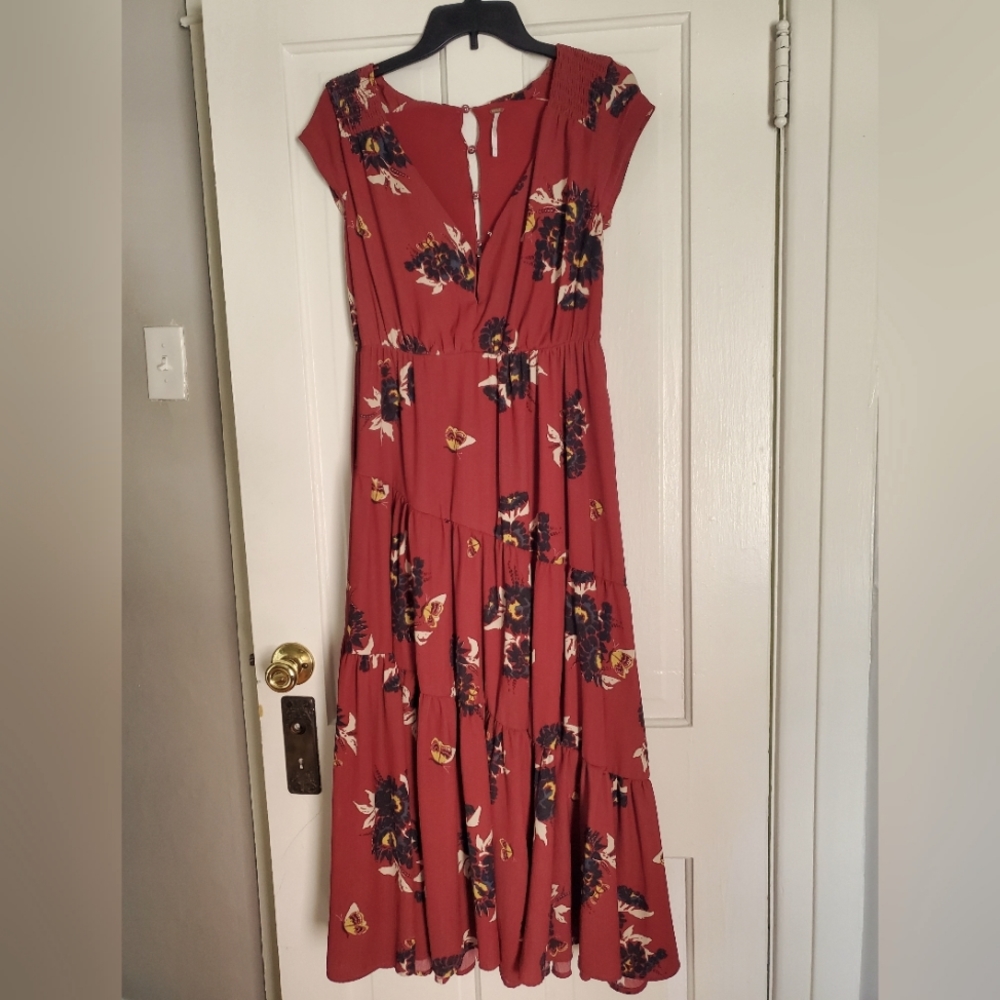 Size 2 Free People Maxi dress in good condition.